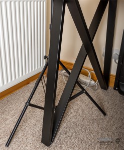 Close up of table leg and how lighting stands will fit underneath.