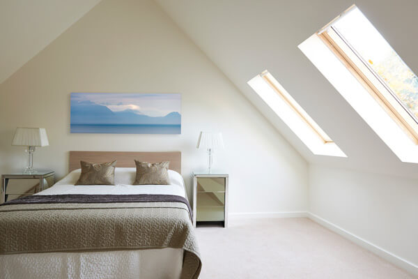 One of our landscape pictures in a bedroom setting